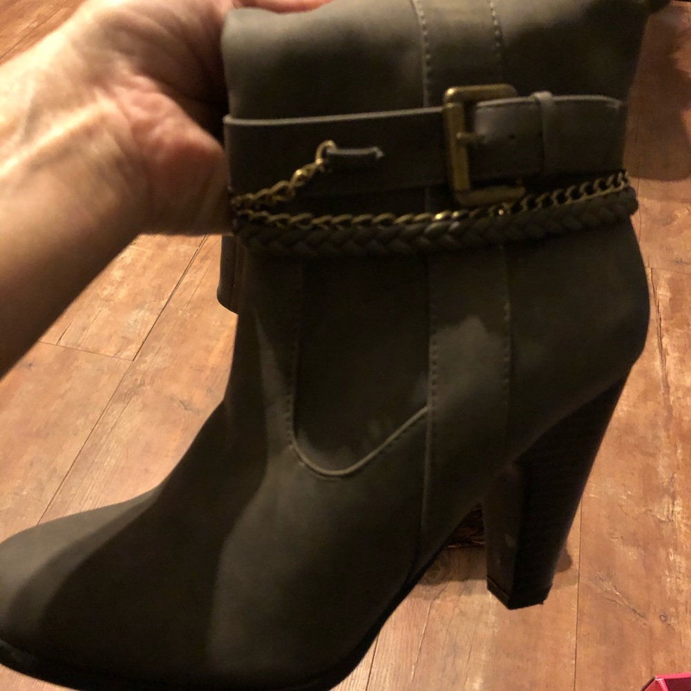 Woman’s Knee High Heeled Boot